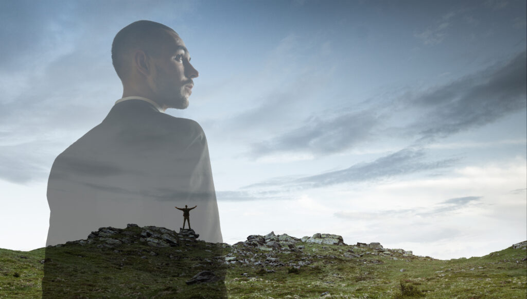 Looking on. Businessman with landscapes on background, double exposure. Lives in megapolis but needs to find herself face to face with nature. Dreams about mental balance. Psycology, eco concept.